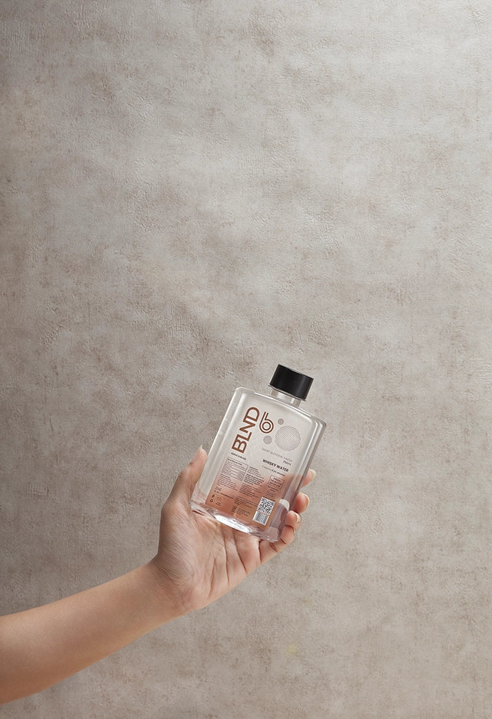 whiskey water with hand