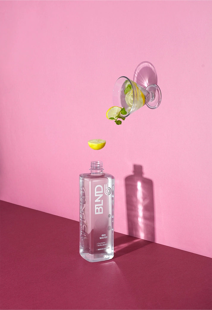 blnd gin tonic water with lemon and glass
